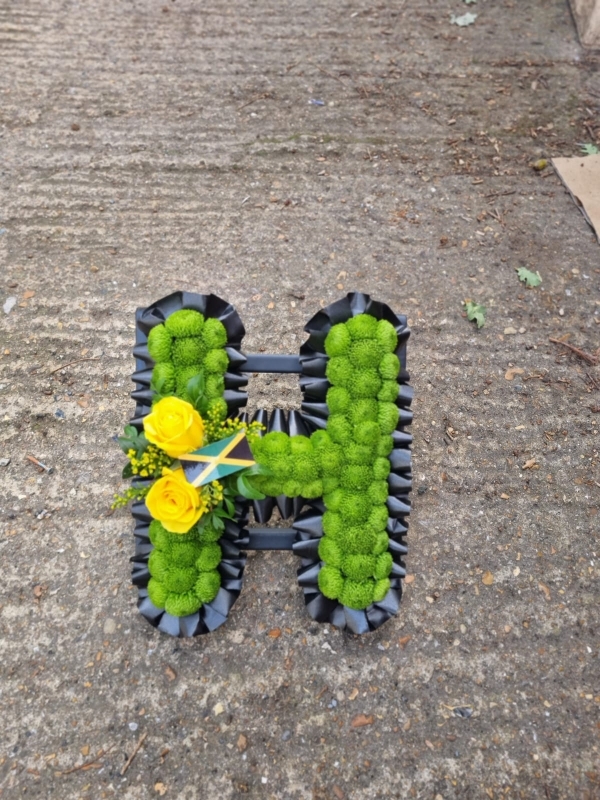 green funeral flowers lettering made by florist in Hayes, Bromley, Kent, UK