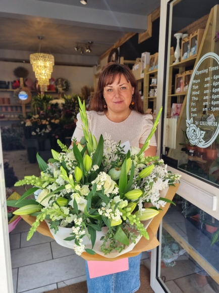 All white flowers bouquet to include big white Lilies made by florist in Hayes, Bromley, Kent