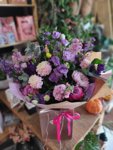 Pinks and Lilacs flowers freestyle bouquet made by florist from Bromley, Kent.