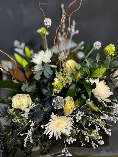 This is an amazing all white bouquet to include blooms, roses, lilies, thisle, white sprayed decorations , pines, winter foliages, eucalyptus, pussy willow, magnolias, twigs to create an amazing winter centerpiece in the house. Made by local independent florist near me in Bromley in Kent, Croydon in Surrey, Beckenham, Elmers End, Orpington, Chislehurst, Penge, Anerey, Biggin Hill, Addiscombe in Croydon, West Wickham BR4, Shirley in Croydon, Gravel Hill in Croydon, Selsdon in Croydon, South Croydon