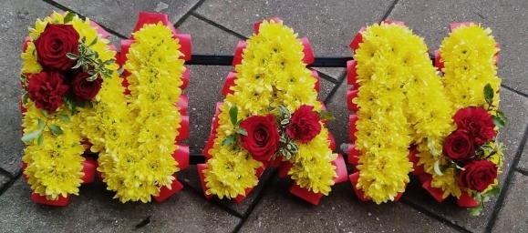 Chrysanthemum letters in yellow