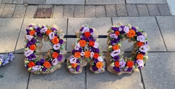 Funeral letters with hessian ribbon instead of plastic ribbon. Natural, eco friendly look. designed by florist from Hayes, Kent