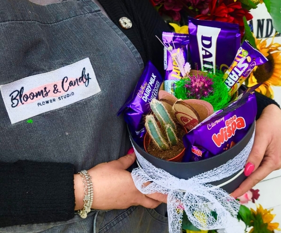 Hat box with sweets and plant perfect gift for a boy or teenager made by florist in Hayes, Bromley