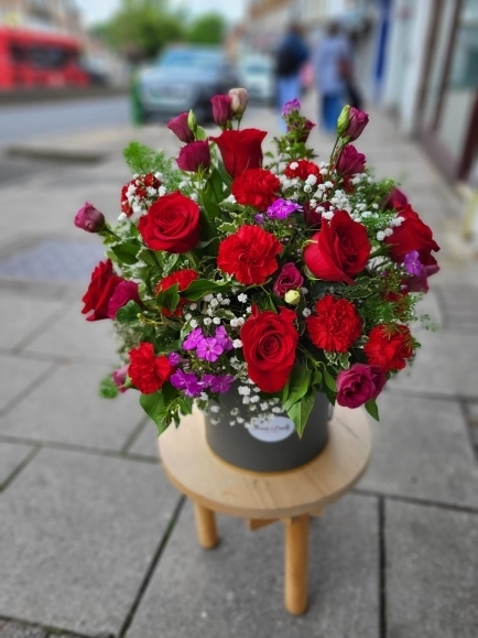 roses and carnations hat box arrangem by florist in Hayes, Bromley, Kent