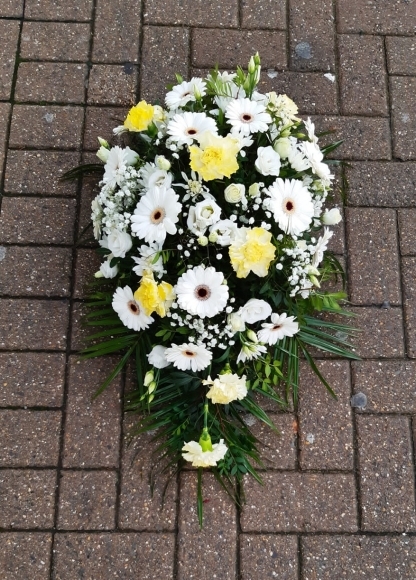 white flowers and lemon carnations teardrop spray made by florist in Bromley for funeral delivery in BR1 BR2 BR3 BR4 BR5 BR6 BR7 BR8 TN16 SE3 SE6 SE9 SE12 CR0